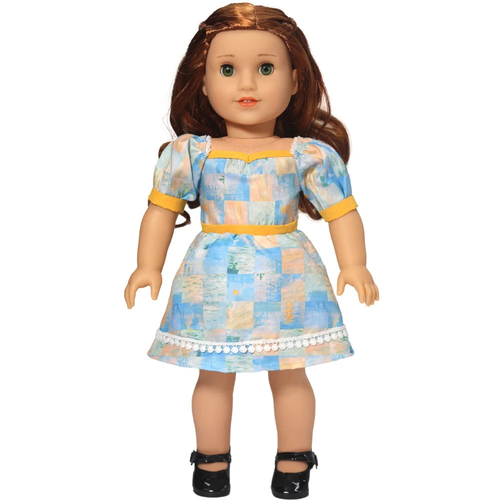Doll wearing a blue checkered dress with yellow accents on a white background