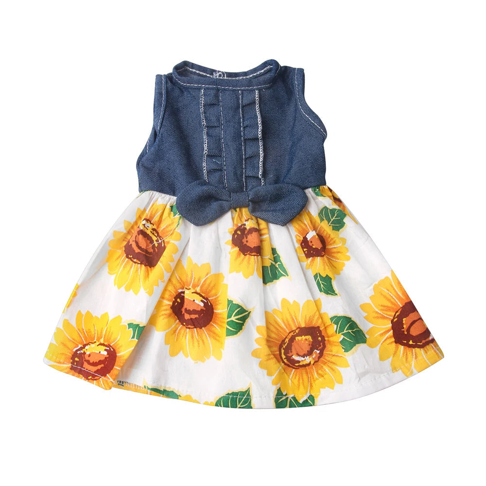 doll's dress with denim top and sunflower skirt on a white background